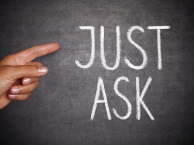 Finger pointing to the words "just ask"